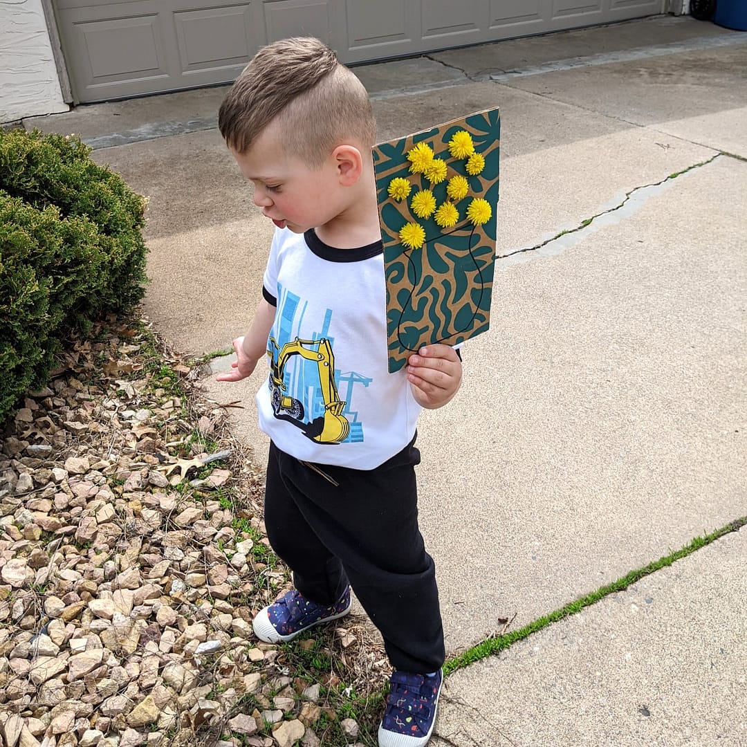 Nature Vase Craft _ Toddler holding completed project _ Abbie Ulstad _ GGH